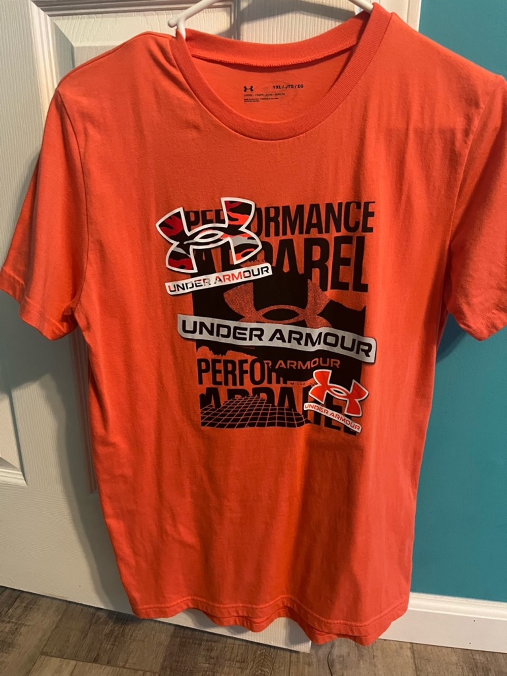 Under Armour boy’s xl Short Sleeve Graphic Tee - Orange with Black Accents